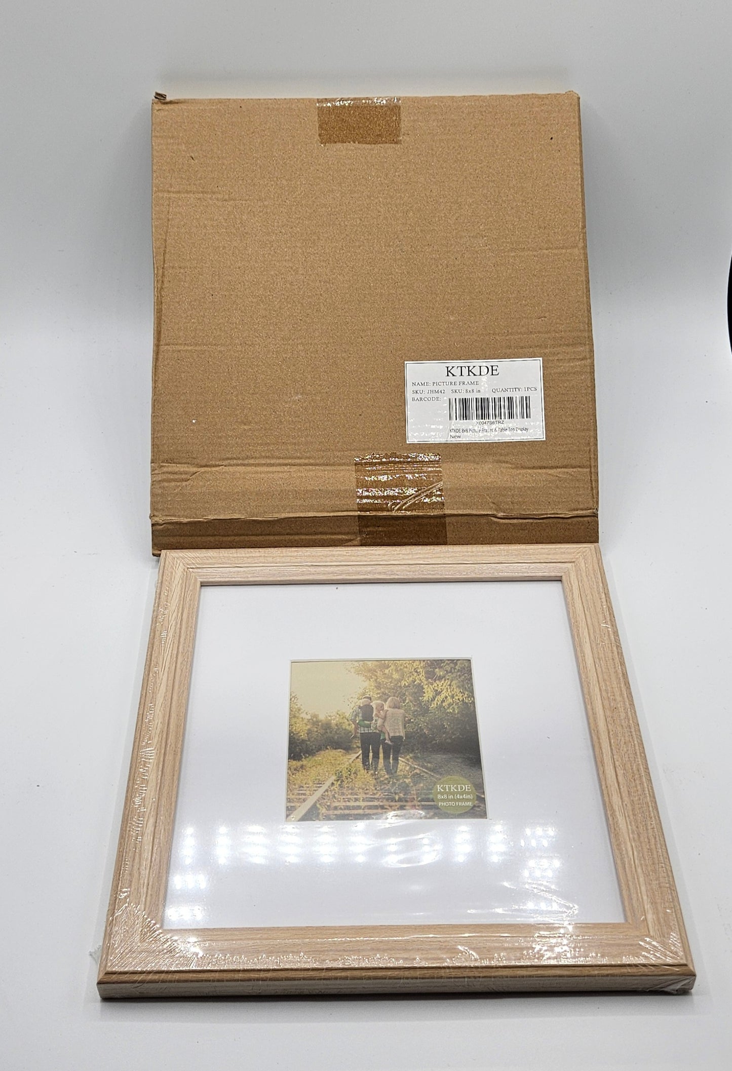 2 - Wood 8×8 inch picture frames.
