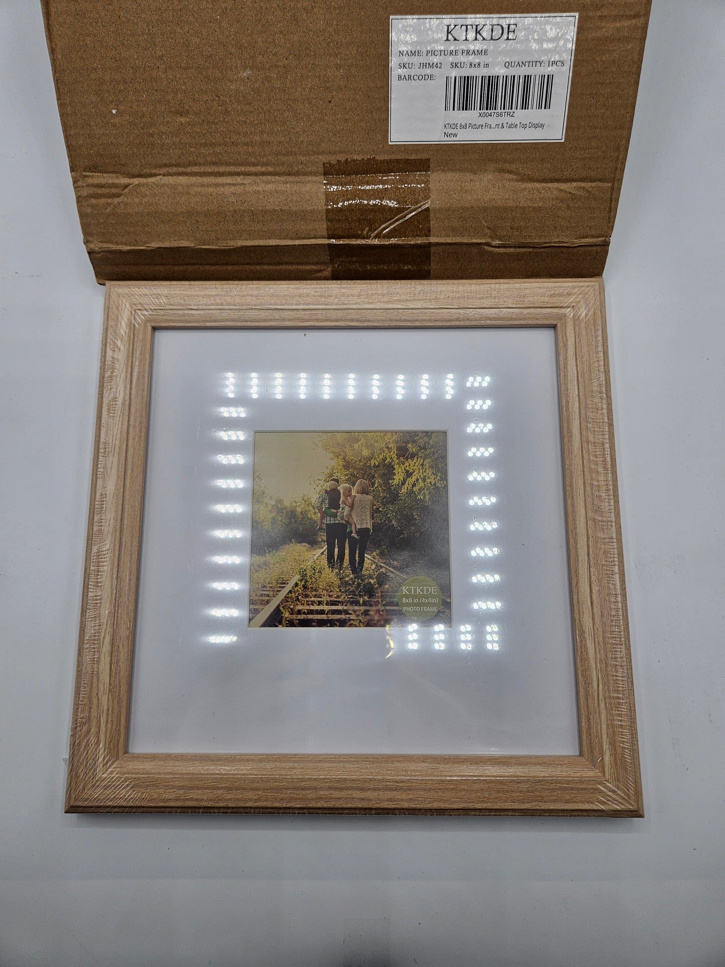 2 - Wood 8×8 inch picture frames.