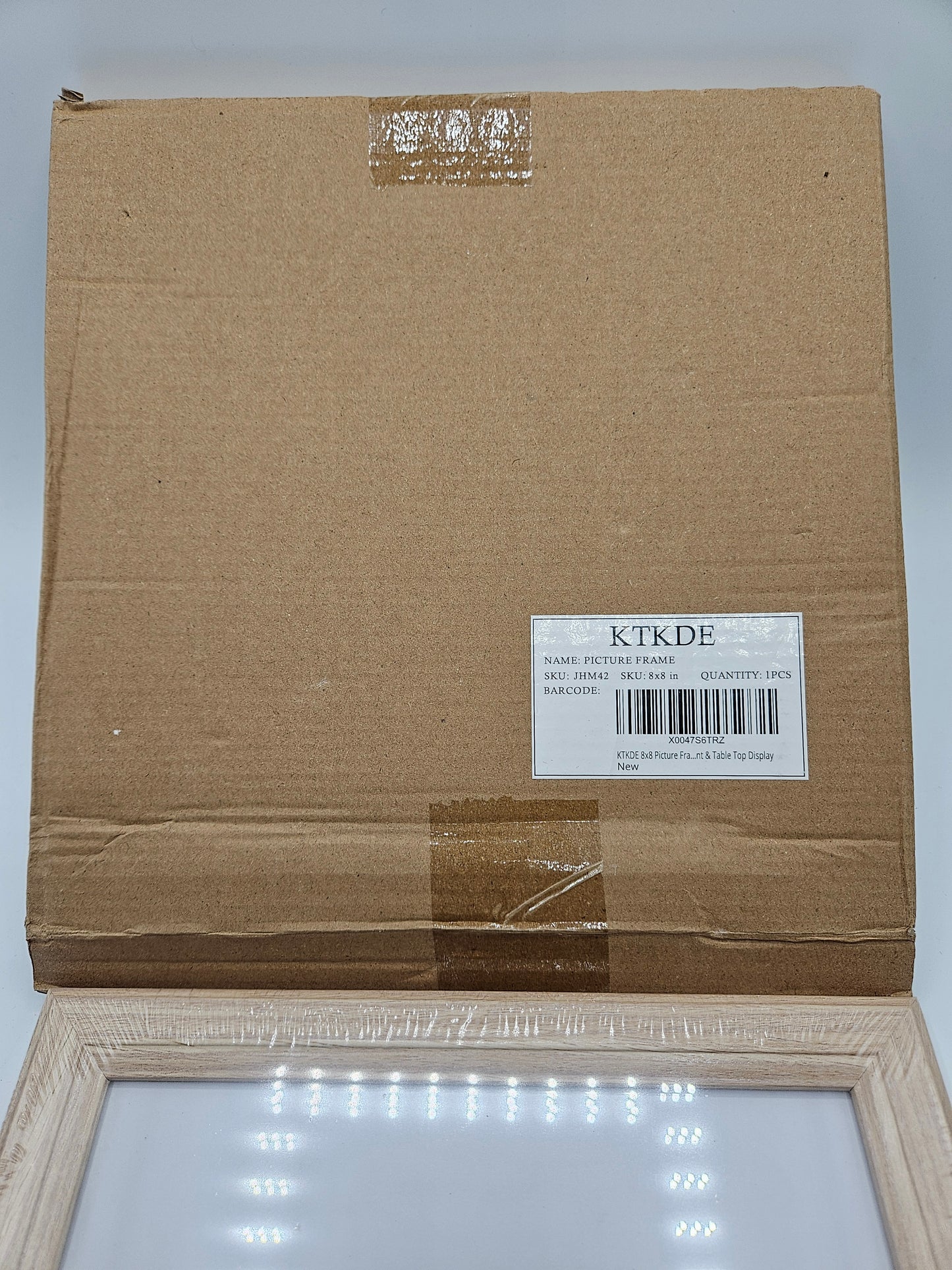 2 - Wood 8×8 inch picture frames.