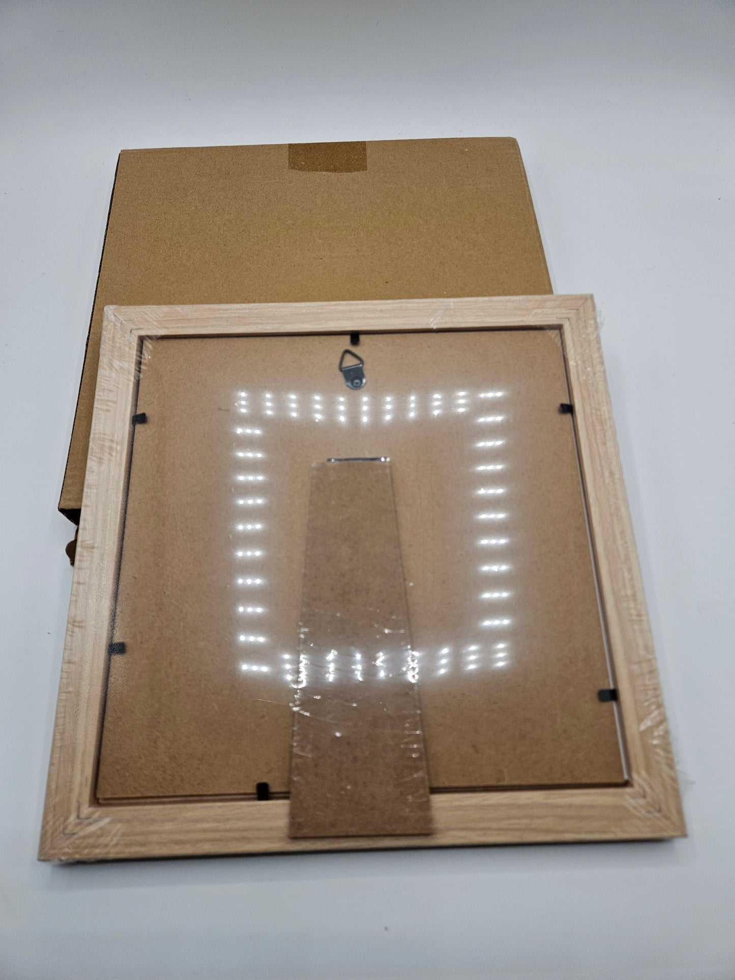 2 - Wood 8×8 inch picture frames.
