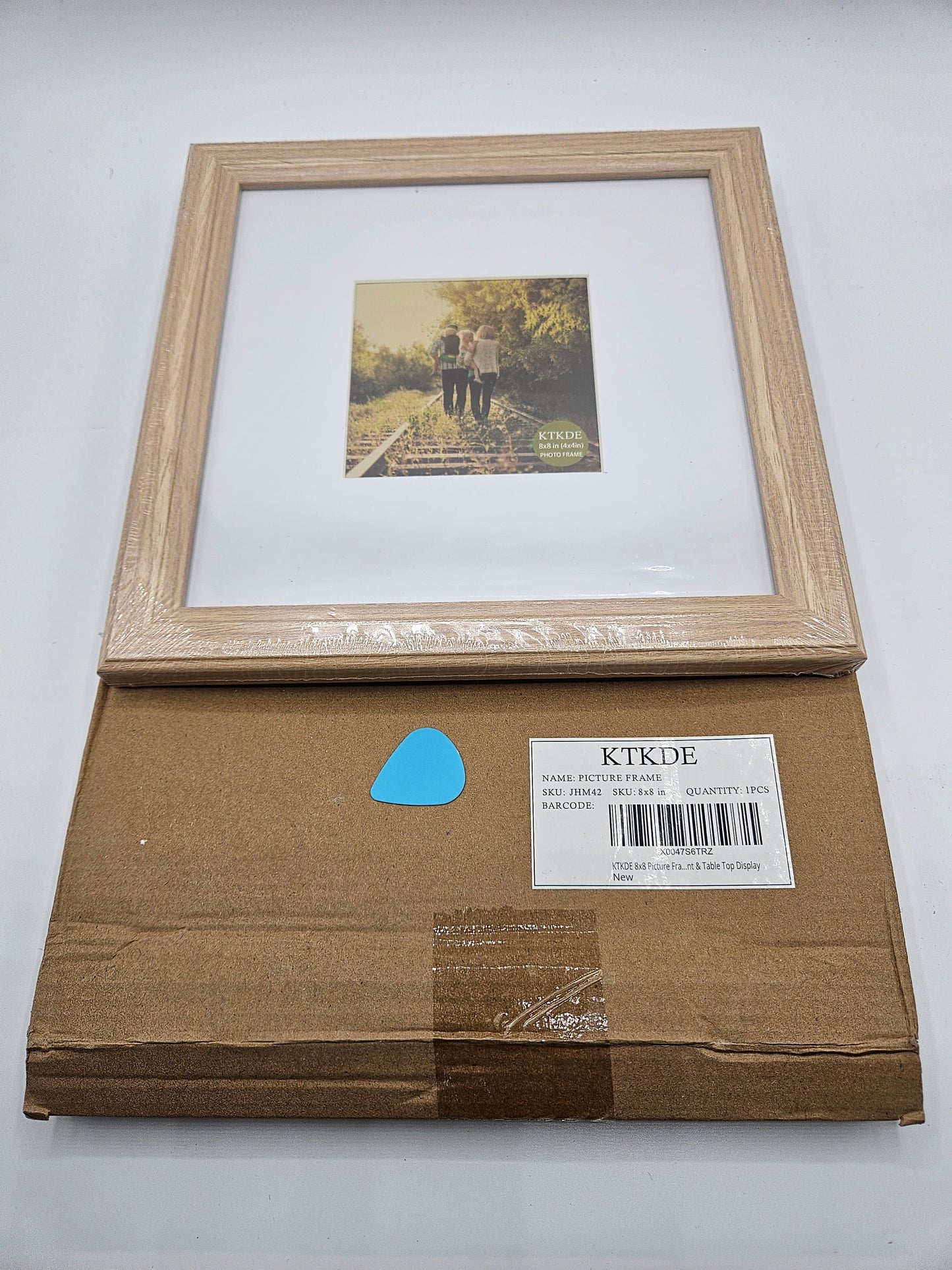 2 - Wood 8×8 inch picture frames.